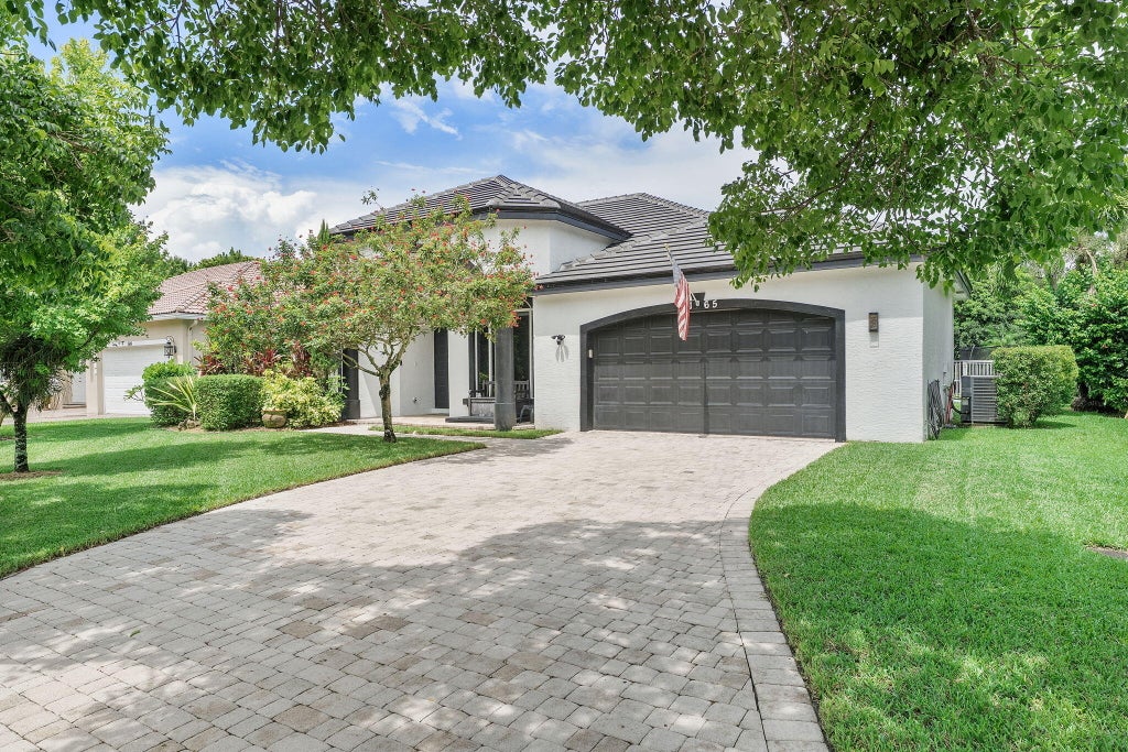 Photo of 5165 NW 50th Avenue, Coconut Creek, FL 33073 (MLS # B26050751)