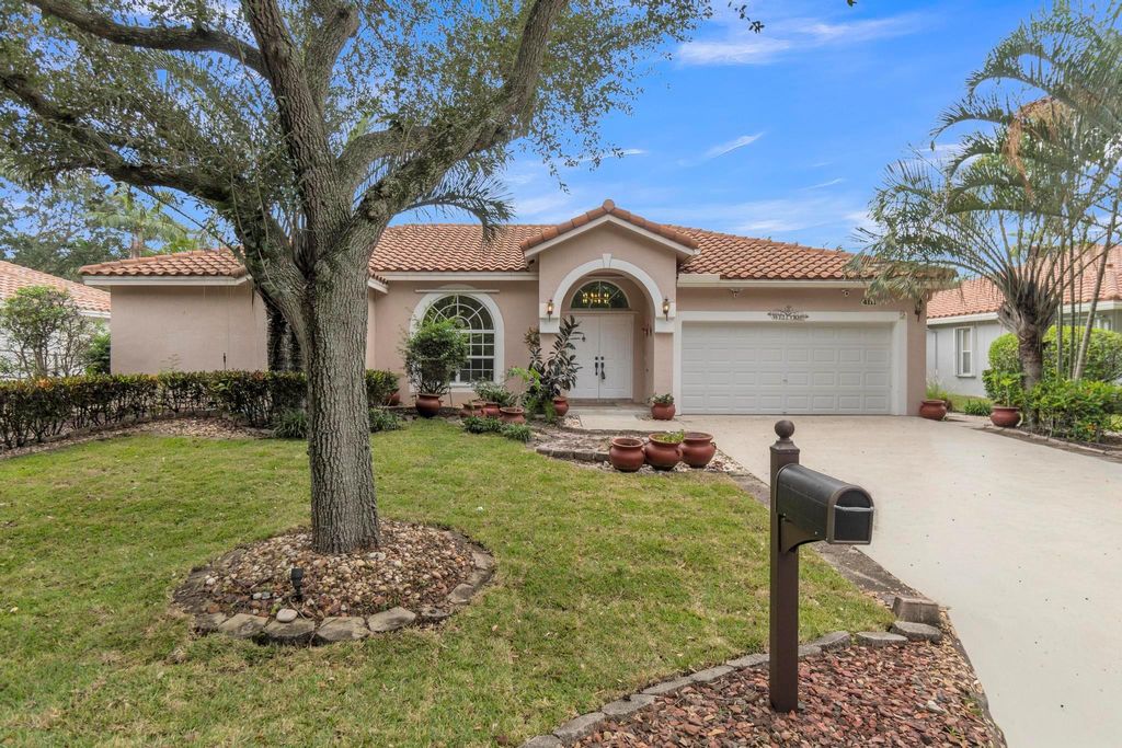 Photo of 4112 NW 58th Dr, Coconut Creek, FL 33073 (MLS # F10542414)