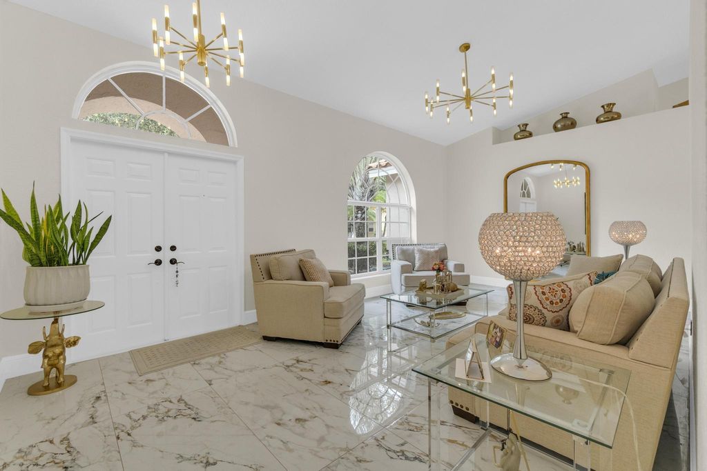 Photo of 4112 NW 58th Dr, Coconut Creek, FL 33073 (MLS # F10542414)