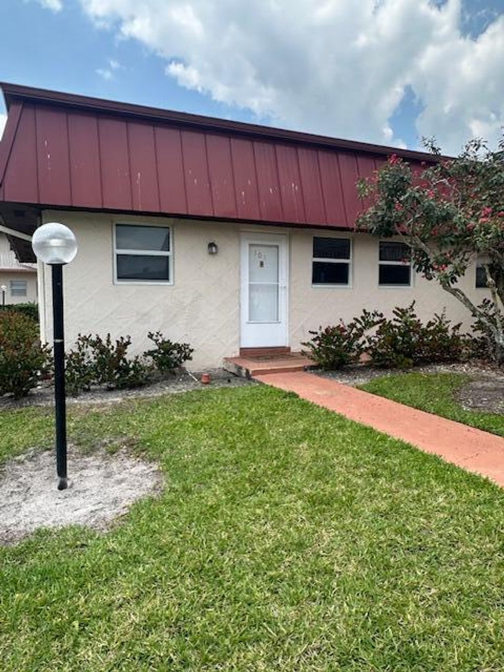 Photo of 12021 W Greenway Drive W #101, Royal Palm Beach, FL 33411 (MLS # B26023380)