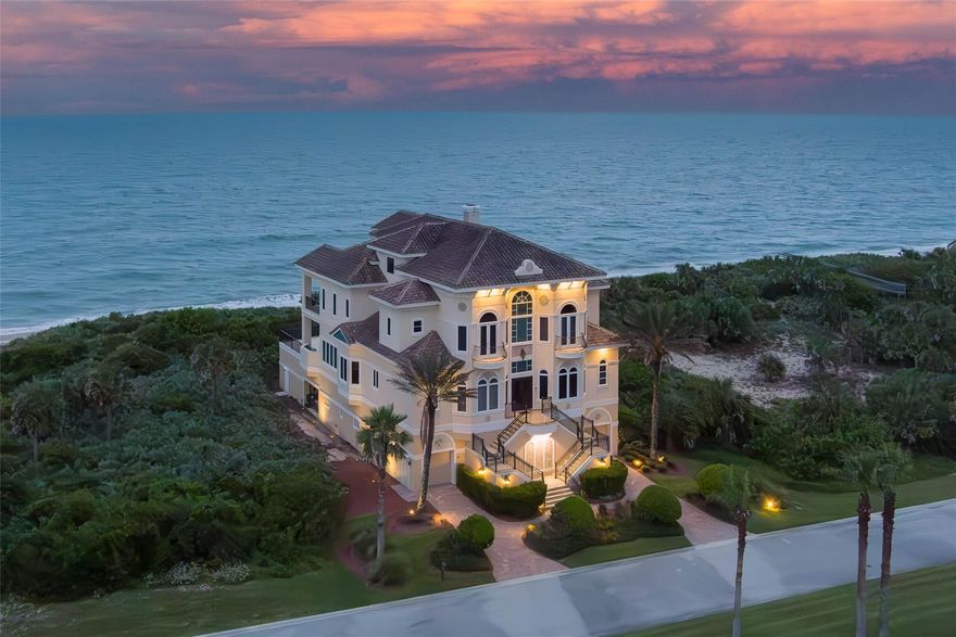This estate offers four levels of luxurious everyday living and entertaining with 180-degree unobstructed views of the Atlantic. A double-barreled imperial staircase welcomes you into the airy main level, defined by a soaring great room and kitchen. Walls of oversized windows and French doors ensure that you are always close to a sea or lake view inside the property connecting seamlessly to the outdoors. The main living and outdoor terrace sit on the second level of the four-story estate, your views extend to the horizon. A swimming pool and spa offer a centerpiece for gatherings on the terrace, while a private dune walkover whisks you down to the beach. Host a gathering indoors or out.