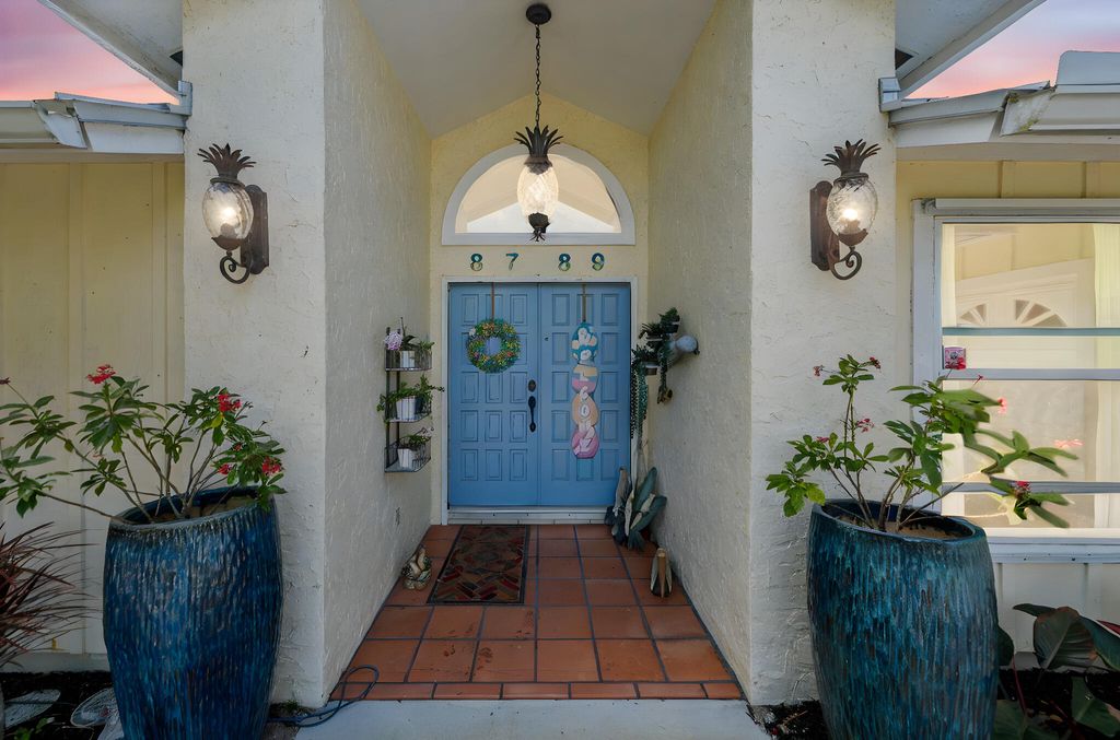 Photo of 8789 SE Woodwind Street, Hobe Sound, FL 33455 (MLS # B26005392)