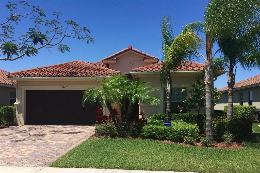 Welcome home to this beautiful LAKE VIEW home in sought after Oakmont Estates. This freshly painted 3 bedroom, 2 bath home features an open living area and spacious kitchen with breakfast nook. Enjoy the Florida lifestyle and stunning lake views on your covered and screened-in rear patio. The master suite features walk-in closets and ensuite bathroom with roman tub. This home has tile floors throughout, ( NO CARPETING ), and the extra convenience of ACCORDION HURRICANE SHUTTERS. Oakmont Estates is located just minutes away from world class equestrian events, Wellington Green Mall and numerous restaurants. Rent includes lawn care, pest control as well as access to the clubhouse and resort style amenities, (pool, fitness center and more). This annual rental is available now