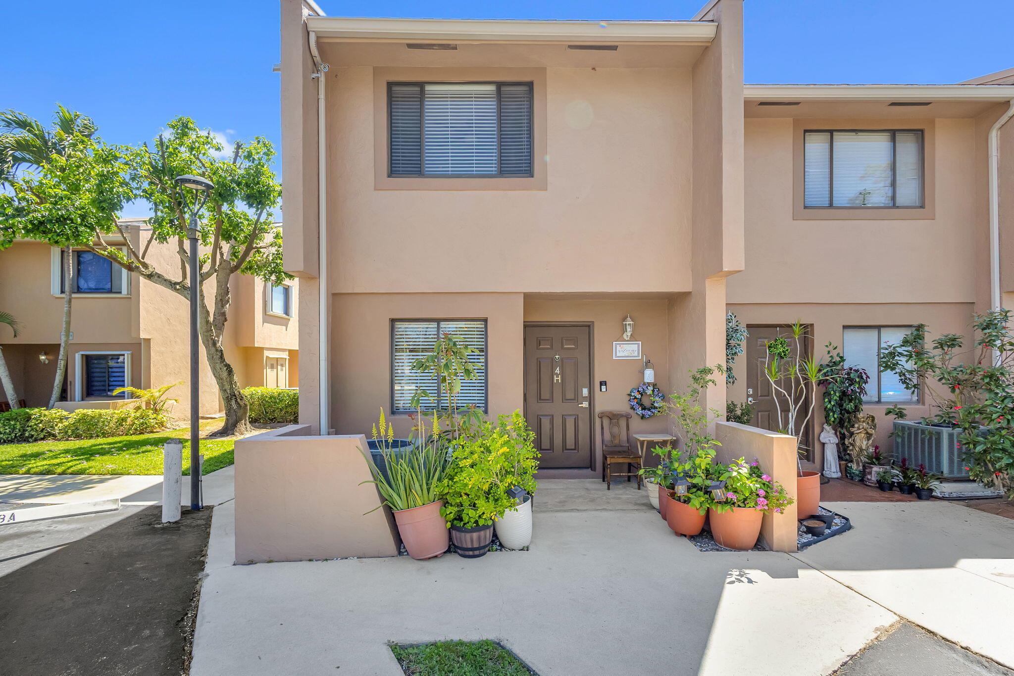 WELCOME TO THIS WONDERFUL 3BR/ 2.1/2 BA CORNER TOWNHOME IN SOUGHT AFTER ROYAL PALM VILLAGE. JUST TUCKED AWAY IN THE HEART OF ROYAL PALM BEACH, SURROUNDED BY PARKS AND RECREATION, SHOPPING, DINING, CLOSE TO SCHOOLS, HWYS & SO MUCH MORE! COMMUNITY POOL IS JUST FOOTSTEPS AWAY FROM BACK DOOR. NEW LUX VINYL PLANK FLOORING THROUGHOUT, RENOVATED BATHS, RECENT S/S APPLIANCES & LARGE CAPACITY WASHER/DRYER, SPACIOUS BEDROOMS, CONVENIENT POWDER ROOM ON MAIN, CUSTOM CLOSETS, SPACIOUS BEDROOMS, 2 DEEDED PARKING SPOTS RIGHT IN FRONT OF YOUR DOOR, QUAINT ENCLOSED COURTYARD-LIKE PRIVATE YARD TO ENJOY OUTDOOR LIVING. GREAT FOR ENTERTAINING! FURNITURE NEGOTIABLE. QUICK CLOSING AVAILABLE. HOA INCLUDES ROOF MAINTENANCE, SEWER, TRASH, EXTERIOR MAINTENANCE & WATER. DON'T MISS THIS OPPORTUNITY!