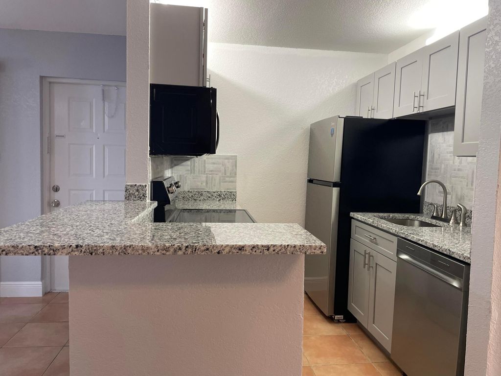 Photo of 5 Crossings Circle #B, Boynton Beach, FL 33435 (MLS # R11047810)