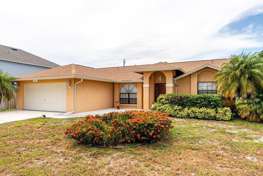 Photo of 2440 SE Toledo Avenue, Port Saint Lucie, FL 34952 (MLS # R11114529)