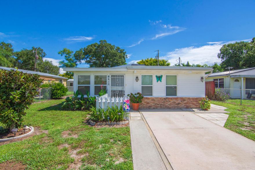 Cute as a button! Ideal location - conveniently located minutes to shops, beaches and restaurants. Two bedrooms with 1.5 baths that have recently been tiled. Fenced yard with plenty of plants with two utility/storage sheds. Enclosed carport and rear porch not included in square footage adding 516 square feet as they are without central AC but easy enough to add a split AC. The ceiling fan keeps you plenty cool especially with updated AC in the main living space and newer roof!