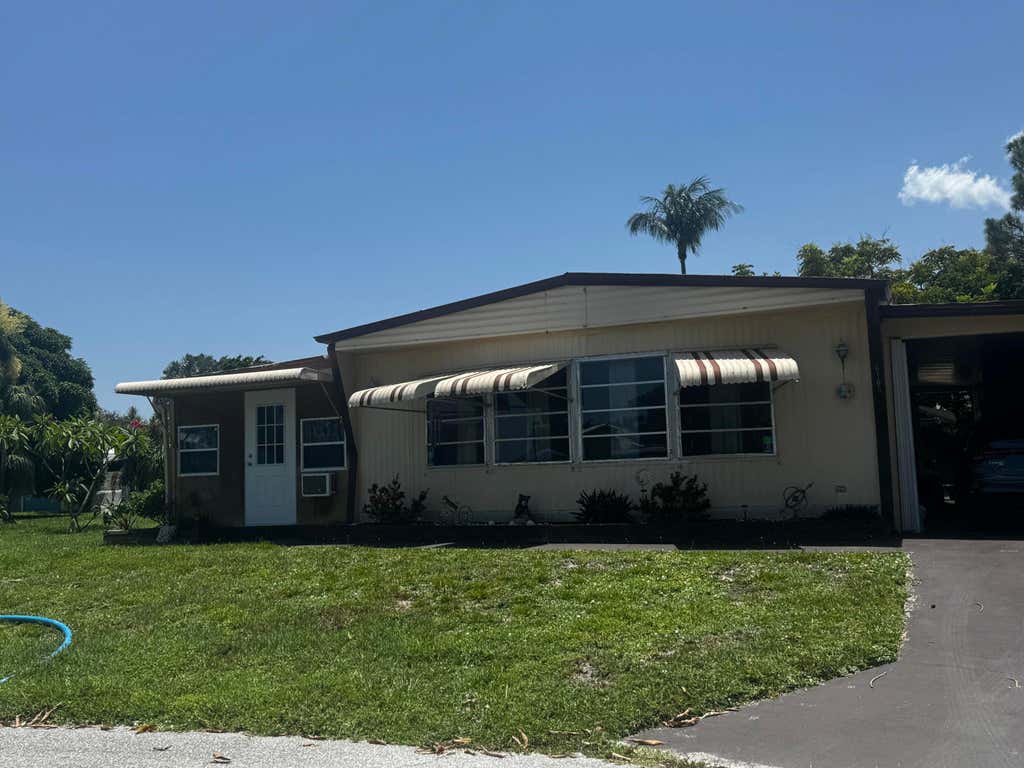 Photo of 6165 N joshua Lane, Lantana, FL 33462 (MLS # B26061151)