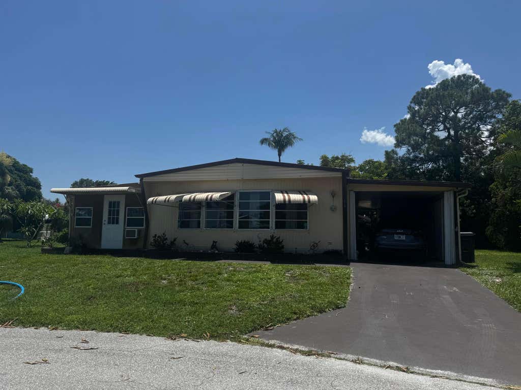 Photo of 6165 N joshua Lane, Lantana, FL 33462 (MLS # B26061151)