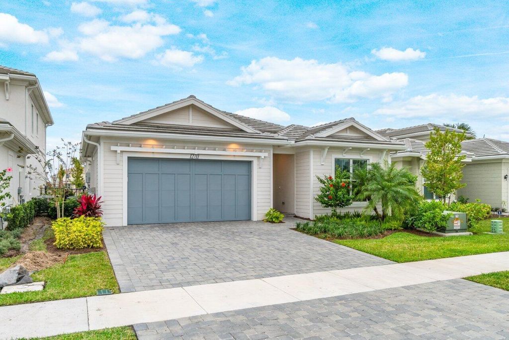 Photo of 12711 Nautilus Circle, Palm Beach Gardens, FL 33412 (MLS # R10949039)