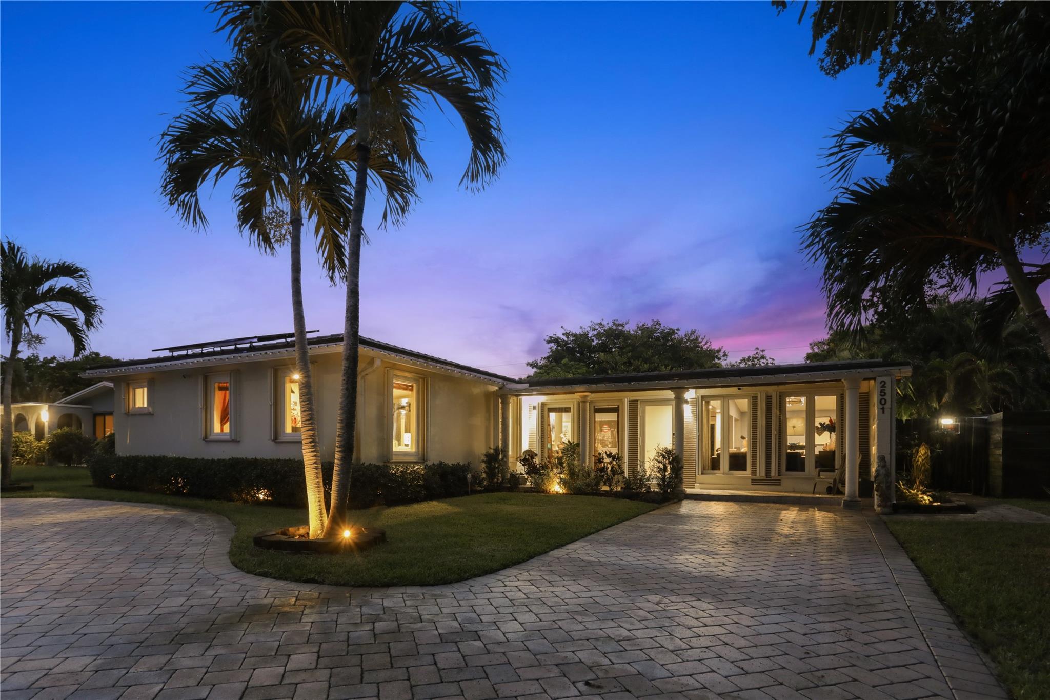 Move-in ready and fully upgraded! This 3-bedroom, 3-bath Wilton Manors home features an open floor plan, an oversized master suite with a sitting area currently used as a home gym, a walk-in closet, and a luxurious bath with a hot tub/jacuzzi. A secondary bedroom has an en-suite bath that doubles as a cabana bath. Also includes a laundry room, 2021 roof, impact windows/doors, upgraded electrical, new solar panels with no debt, and a fast EV charging station. Tankless Water Heater. Enjoy a deep pool on an oversized lot just 1 block from Mickel Field. Located in one of Wilton Manors' hottest neighborhoods, with plans underway to bring FPL lines underground—adding long-term value. Minutes to shopping, dining, and nightlife. A must-see!