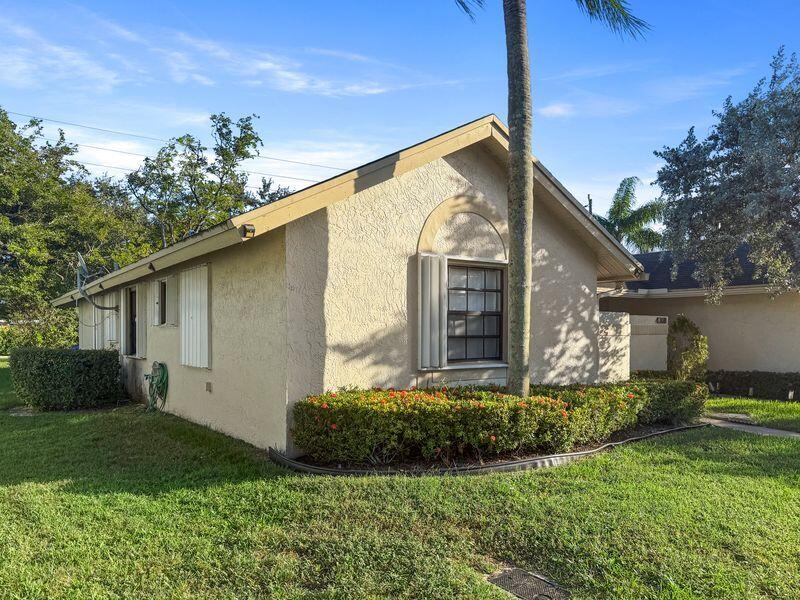 Photo of 4316 NW 120TH Lane #A, Sunrise, FL 33323 (MLS # B26090838)