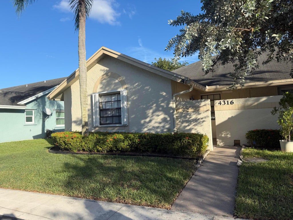 Photo of 4316 NW 120TH Lane #A, Sunrise, FL 33323 (MLS # B26090838)