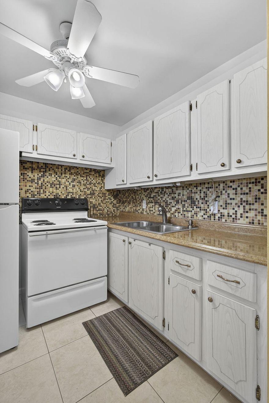 TURNKEY! MOVE INTO THIS LIGHT & BRIGHT 2ND FLOOR 1 BED 1.5 BATH UNIT.BEAUTIFULLY UPDATED BATHROOMS NEW KITCHEN APPLIANCES NEWER HOT WATER HEATER STYLISH FURNITURE. CERAMIC TILE THROUGHOUT WELL MANAGED ASSOCIATION. SIT OUT AND RELAX ON THE ASSOCIATION'S PATIO. STEPS TO THE CAMDEN POOL. COME & ENJOY RESORT STYLE LIVING IN THIS GATED COMMUNITY FOR ADULTS 55 +CLUBHOUSE features a theater, indoor pool, card room, community/party room, billiard room ,shuffle board ,tennis , pickleball ,bocce and two outdoor pools. Numerous heated outdoor pools throughout the community. Separate fitness center with gym , outdoor heated pool and a resistance pool. Two guarded gates and 24 hour roving security patrol. GREAT LOCATION: close to shops, restaurants, PBI airport and beaches.