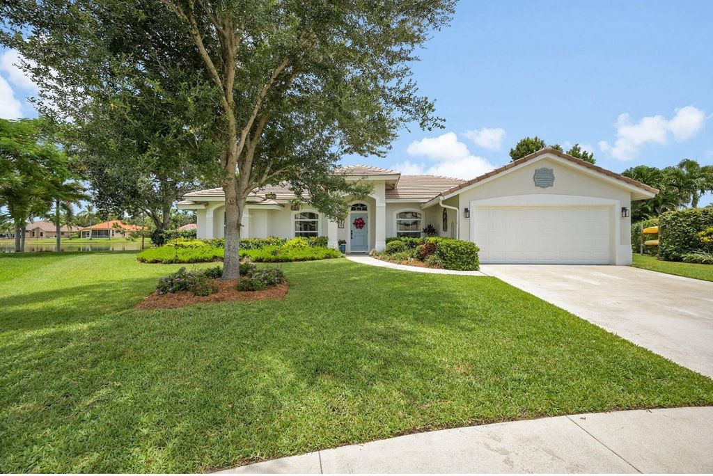 Photo of 110 Jacaranda Court, Royal Palm Beach, FL 33411 (MLS # R11127657)