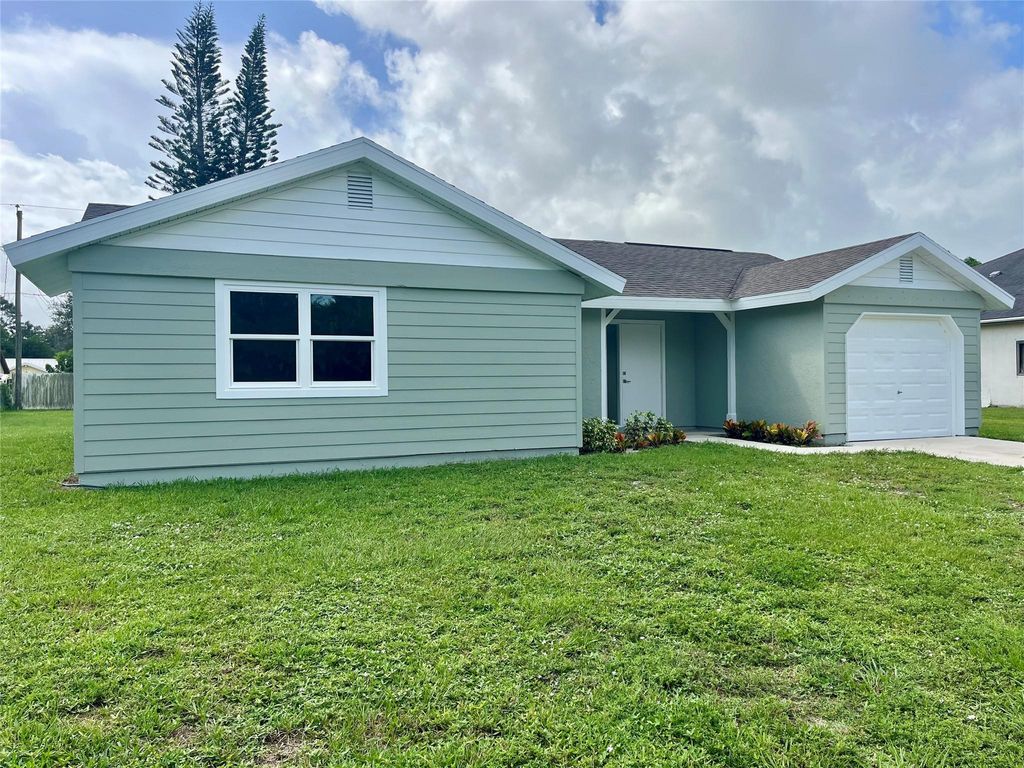 Photo of 965 Highland Dr SW, Vero Beach, FL 32962 (MLS # F10530213)