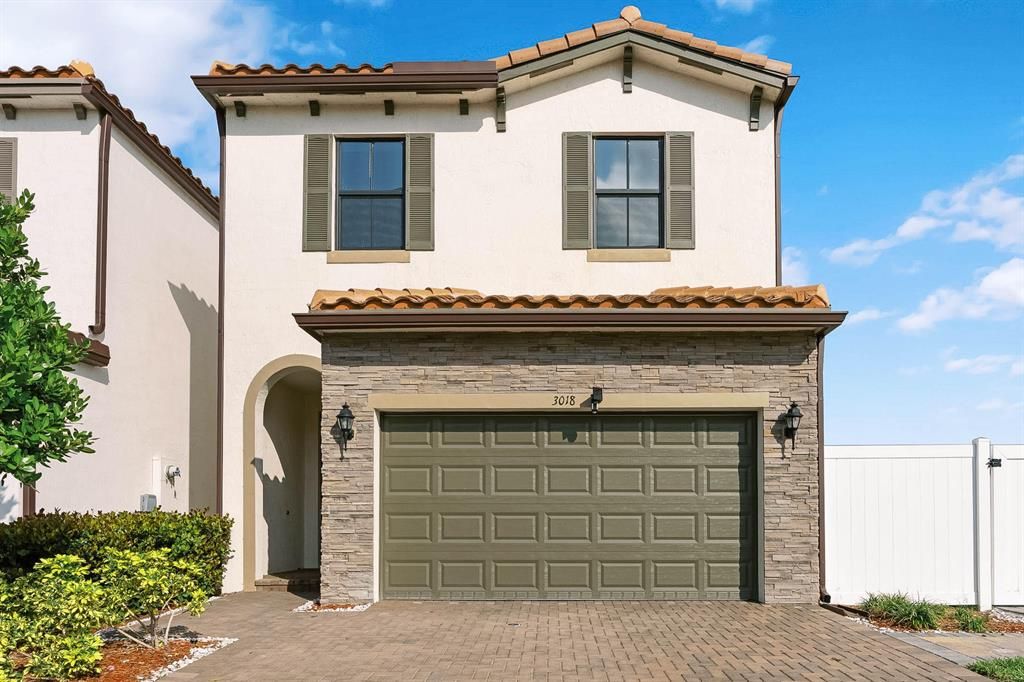 Photo of 3018 King Palm Way, Riviera Beach, FL 33410 (MLS # R10701400)