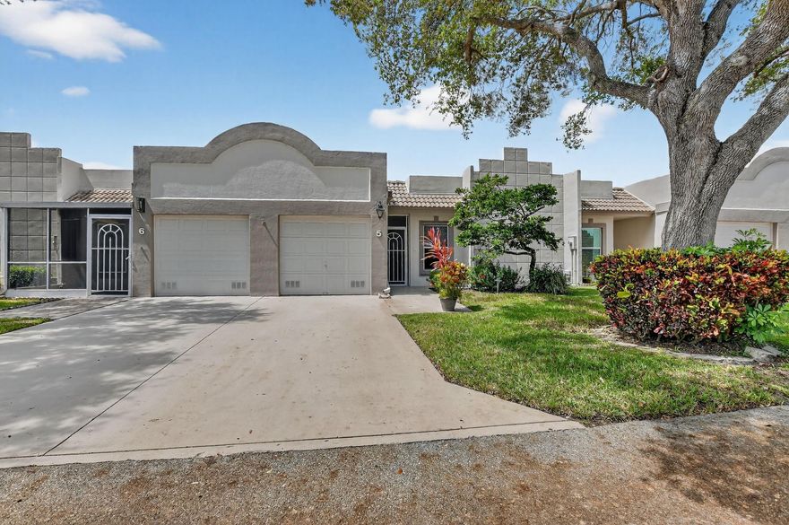 Stunning View from a Spacious Patio   Nestled in a vibrant 55+ community of town villas, this updated home is freshly painted and ready for you to move in. Enjoy a spacious master bedroom with a peaceful lake view, a separate vanity area, and a large shower. The eat-in kitchen and the guest bedroom with its own bath are perfect for hosting visitors. Plus, you’ll have a one-car garage and access to fantastic amenities like tennis, pickleball, a heated pool, a gym, bocce, and more! Become part of a welcoming community that balances relaxation and fun.   A/C under 1 year new…..
Maintenance =  Quarterly $850.00 HOA , Quarterly $288.00 Master Assoc. =( $379.33 per month )
HURRICANE PANELS IN GARAGE.