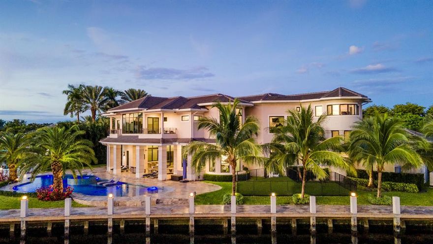 Only 1 mile from Pine Crest School!! Built in 2017 by Shane Ames of Ames International Architecture, this extraordinary custom estate with 250 feet of water frontage sits on an expansive point lot located within the exclusive gated of Bay Colony community in east Fort Lauderdale.  A modern-transitional design with stately architecture and luxurious detailing boasts expansive views from every room and positioned minutes from deep-ocean access!  Features of the smart home include 6 bedrooms all with en-suite bathrooms plus media room, gym, playroom, chef's kitchen w/Wolf - Sub-Zero appliances, large formal dining room - seats 20, indoor/outdoor living and entertainment space, grand resort-style pool, A/C garage storage - up to eight cars (w/ lifts) and a full-home 125kW generator.