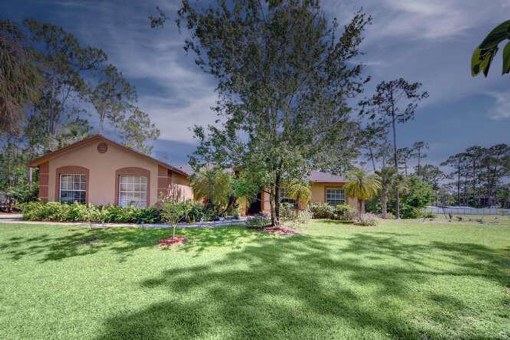 Photo of 15430 Tangelo Blvd. Boulevard Blvd, West Palm Beach, FL 33412 (MLS # R10722552)