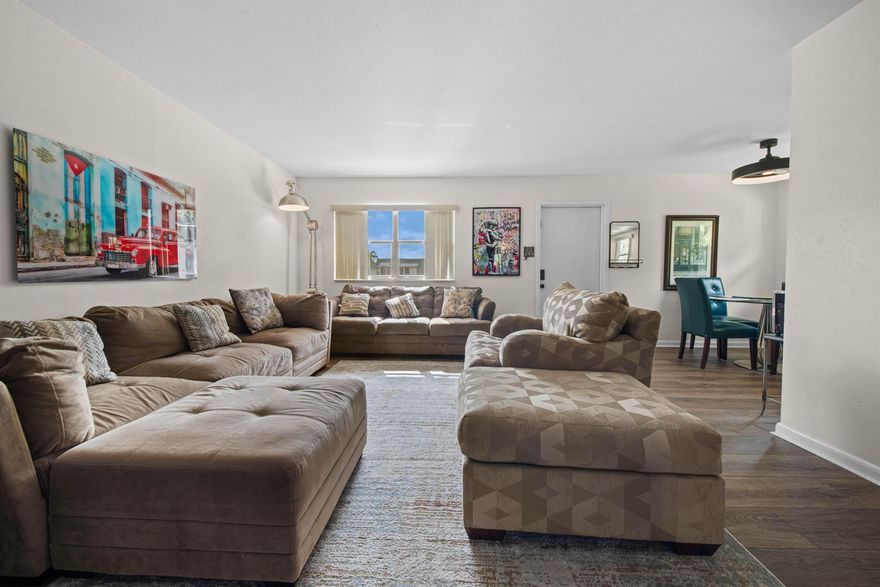 Turnkey 2-bedroom, 2-bath corner unit condo in the highly desirable 55+ Kings Point community. Fully furnished and move-in ready, this updated unit features an open-concept layout, new appliances, and in-unit washer and dryer - a rare convenience. The spacious primary suite offers a walk-in closet and contemporary en-suite bath with a step-in glass shower, and both bathrooms have been tastefully redone.Kings Point residents enjoy resort-style amenities, including six pools (indoor/outdoor), three clubhouses, two 18-hole golf courses, tennis, pickleball, bocce, shuffleboard, table tennis, fitness studio, performing arts theater, cafes, and a courtesy shuttle to local shopping. Guarded gate and close to beaches. Don't miss this opportunity to own one of the finest units in Kings Point!