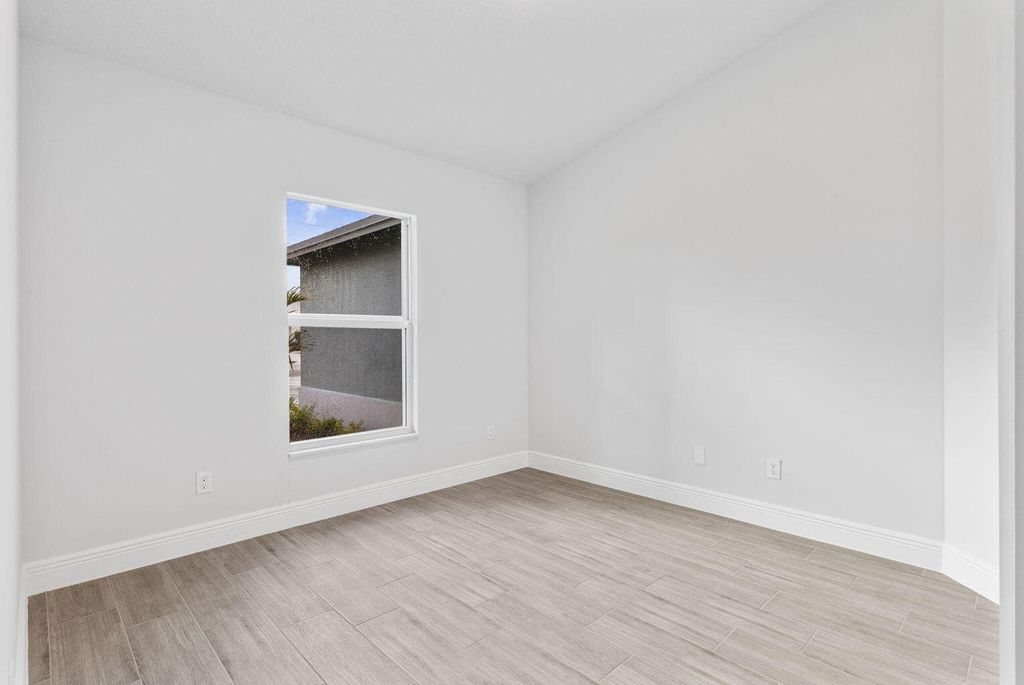 Photo of 1949 SW Bayshore Boulevard, Port Saint Lucie, FL 34984 (MLS # R11167218)