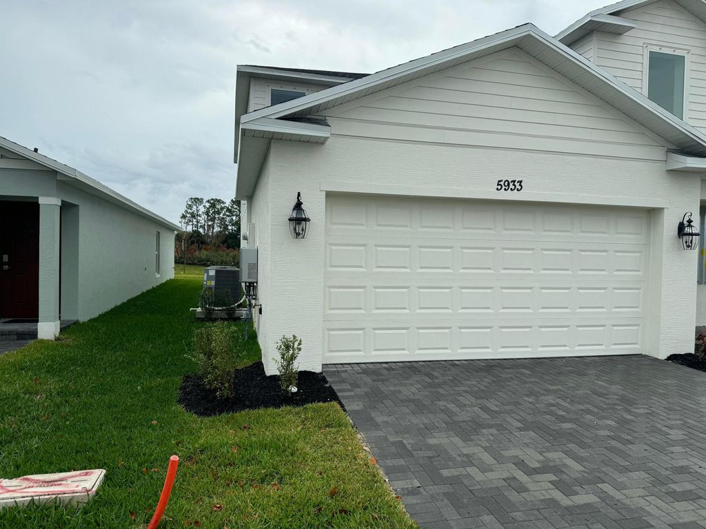 Photo of 5933 NW Sweetwood Drive, Port Saint Lucie, FL 34987 (MLS # R11167633)