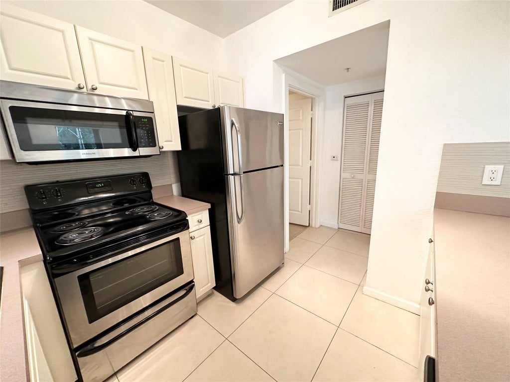 Photo of 6778 W SAMPLE Road #6778, Coral Springs, FL 33067 (MLS # B26087897)