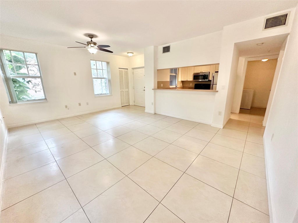Photo of 6778 W SAMPLE Road #6778, Coral Springs, FL 33067 (MLS # B26087897)