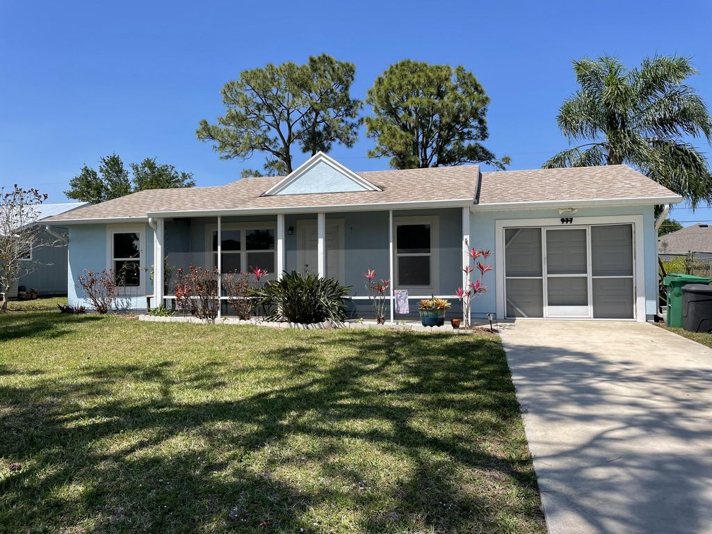 Photo of 977 SW Longfellow Road, Port Saint Lucie, FL 34953 (MLS # R10787411)