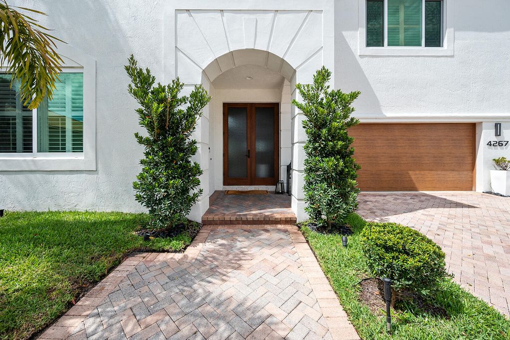 Photo of 4267 NW 65th Place, Boca Raton, FL 33496 (MLS # R10981735)