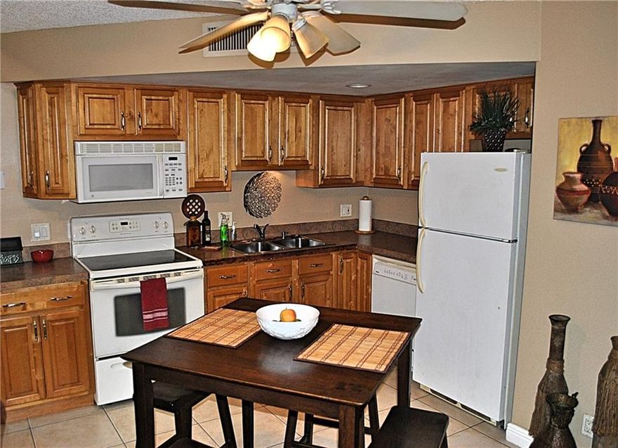 Take advantage of this amazing deal in Deerfield Beach Country Club condo with no restrictions on parking or pets. Ground floor unit offers loft style features with an upstairs master bathroom with jacuzzi tub. The fully renovated kitchen overlooks your spacious and private balcony. Monthly fees are $284 which includes landscaping, water, sewer, and trash. Unit has a washer and dryer on the ground floor as well as a full bathroom UPSTAIRS DOWNSTAIRS!