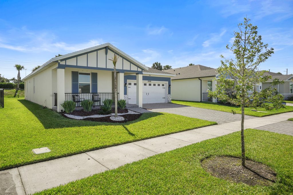 Photo of 8588 Dahlia Circle, Port Saint Lucie, FL 34986 (MLS # B26027997)
