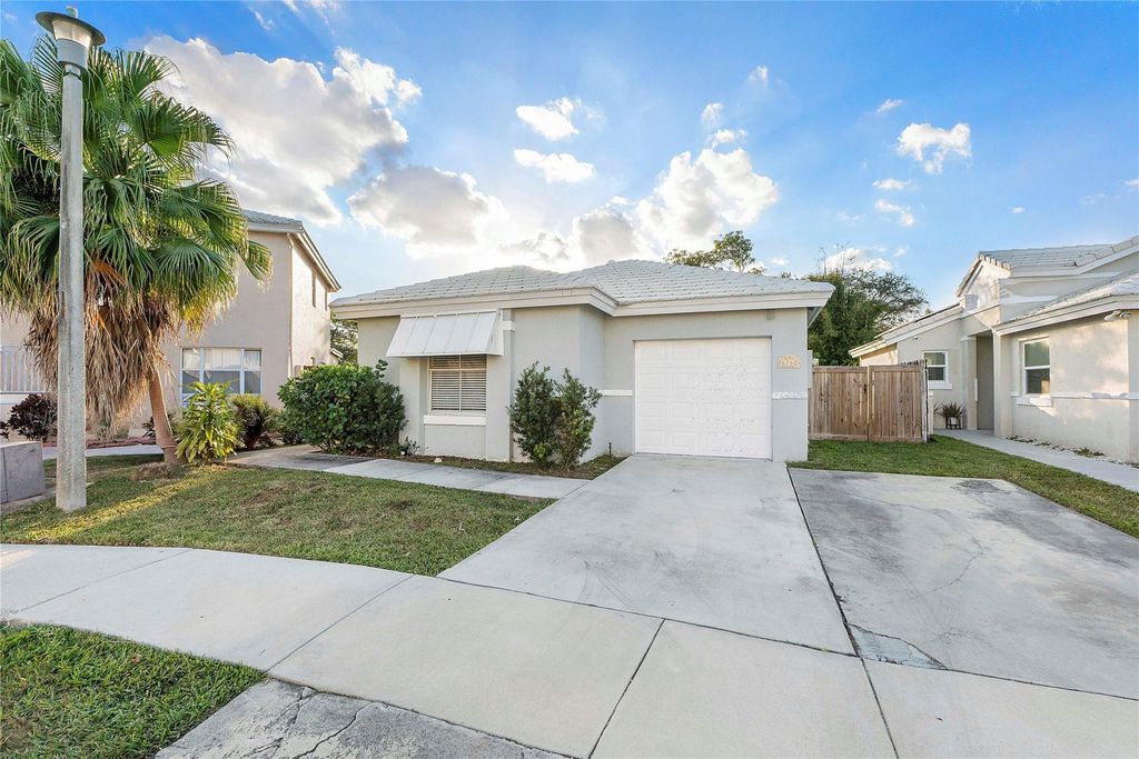 Photo of 6762 Fern Place, Pompano Beach, FL 33063 (MLS # F10550836)