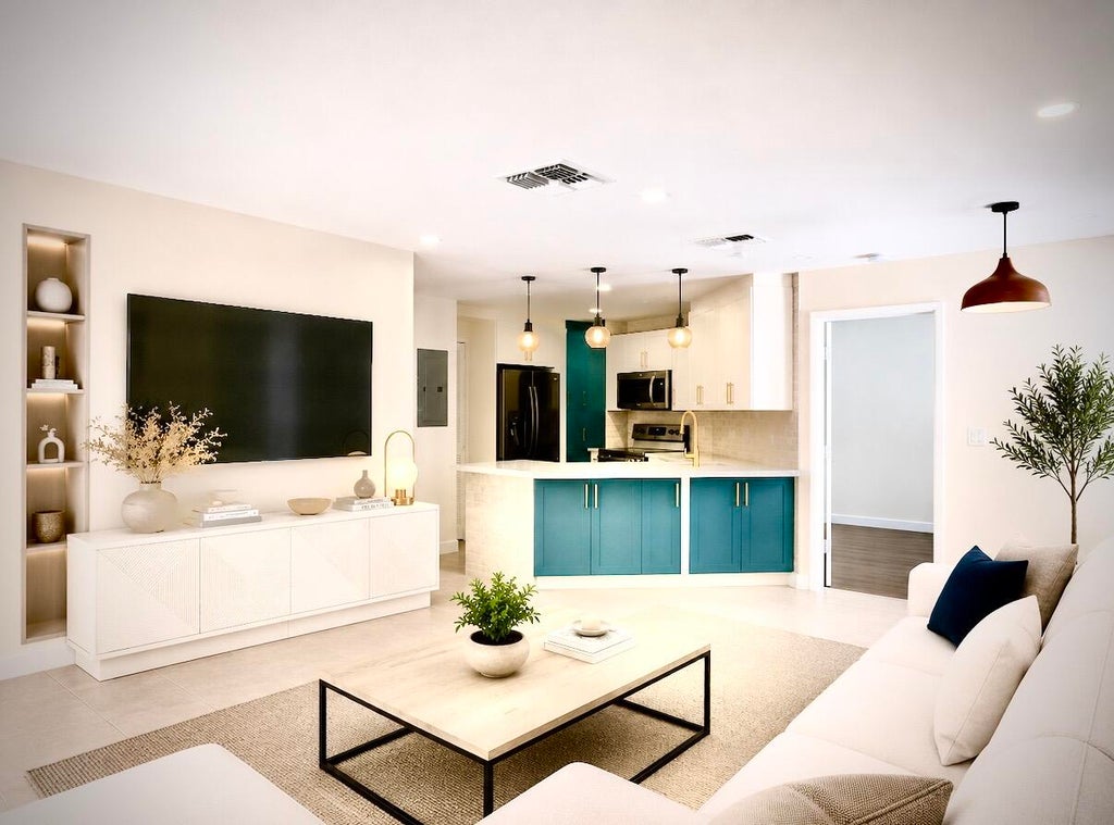 Photo of 825 DOGWOOD Drive #B, Delray Beach, FL 33483 (MLS # B26064610)