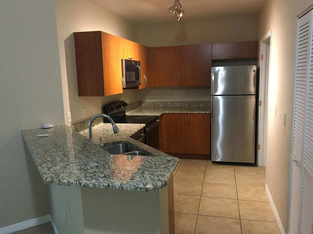 Photo of 154 SW Peacock Boulevard #28204, Port Saint Lucie, FL 34986 (MLS # B26015269)