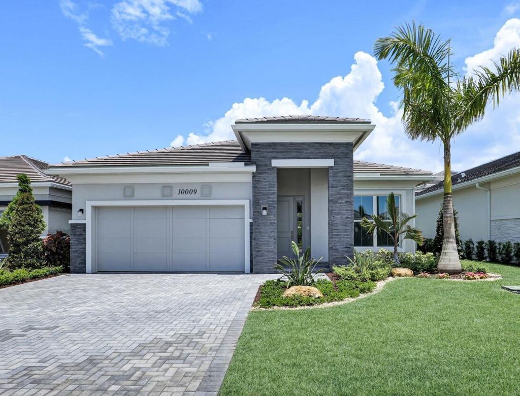 Photo of 10009 Driftwood Way, Palm Beach Gardens, FL 33412 (MLS # R11074268)