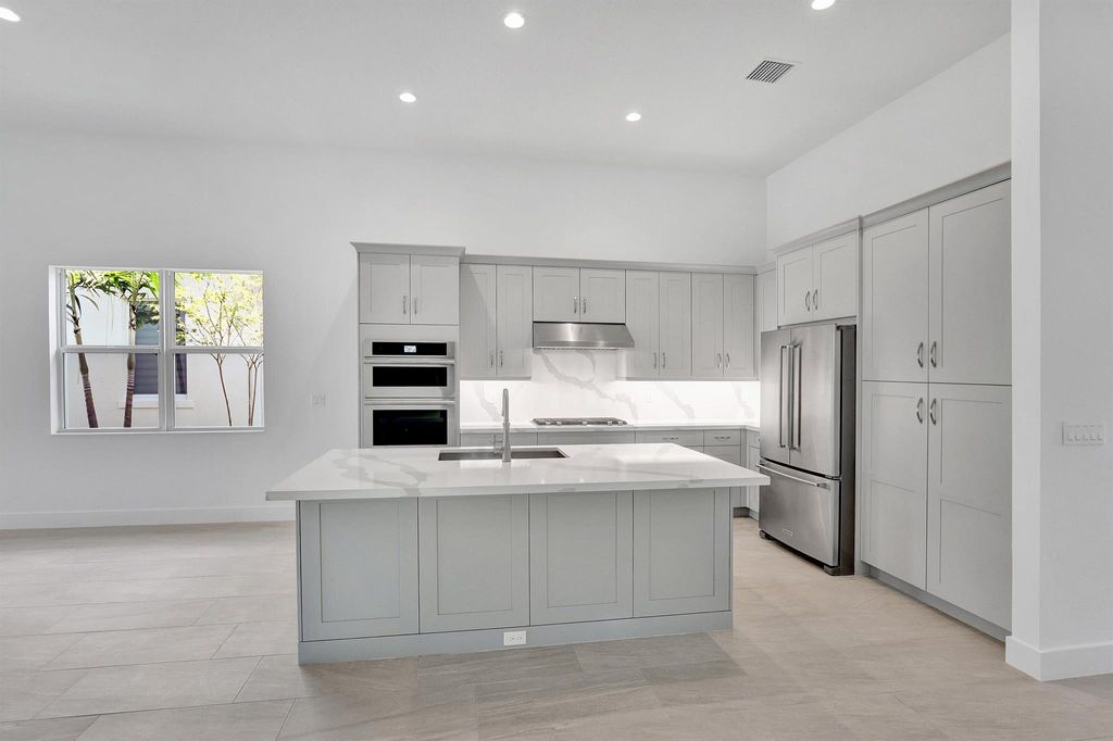 Photo of 10009 Driftwood Way, Palm Beach Gardens, FL 33412 (MLS # R11074268)