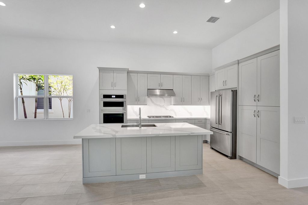 Photo of 10009 Driftwood Way, Palm Beach Gardens, FL 33412 (MLS # R11074268)