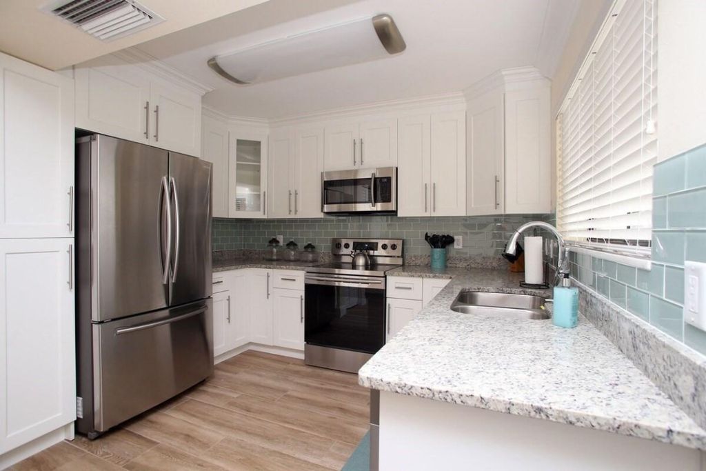 Photo of 67 Balfour Road, Palm Beach Gardens, FL 33418 (MLS # F10537352)