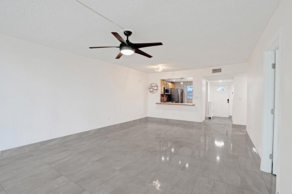 Photo of 8301 SANDS POINT Boulevard #S102, Tamarac, FL 33321 (MLS # B26082421)
