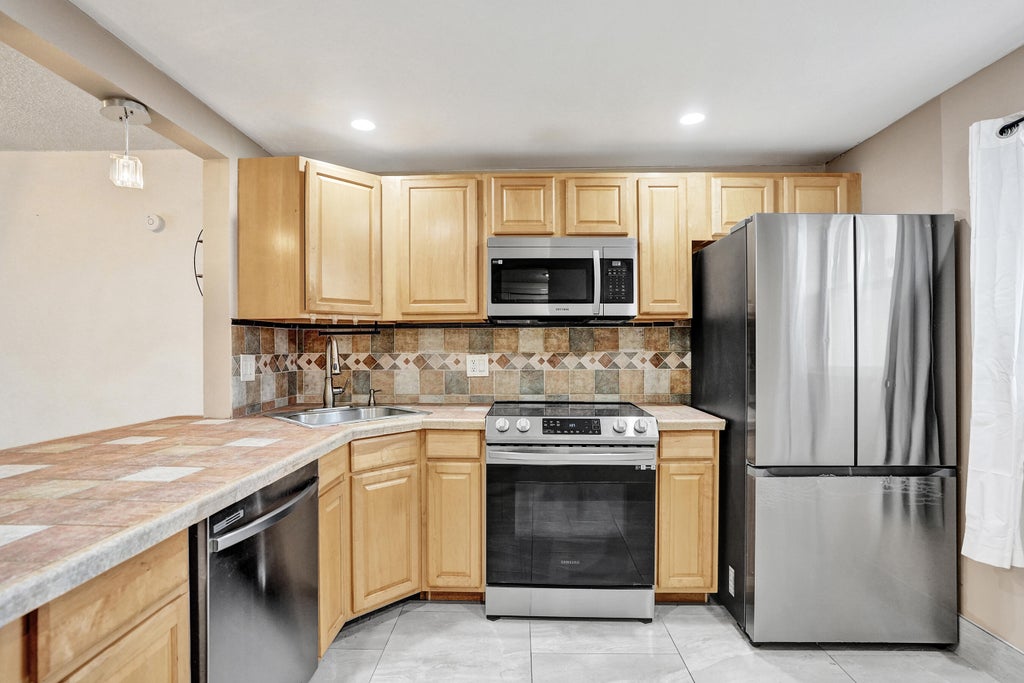 Photo of 8301 SANDS POINT Boulevard #S102, Tamarac, FL 33321 (MLS # B26082421)