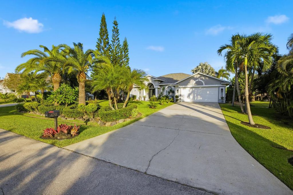 Photo of 4211 SW Tumble Street, Port Saint Lucie, FL 34953 (MLS # R11141949)