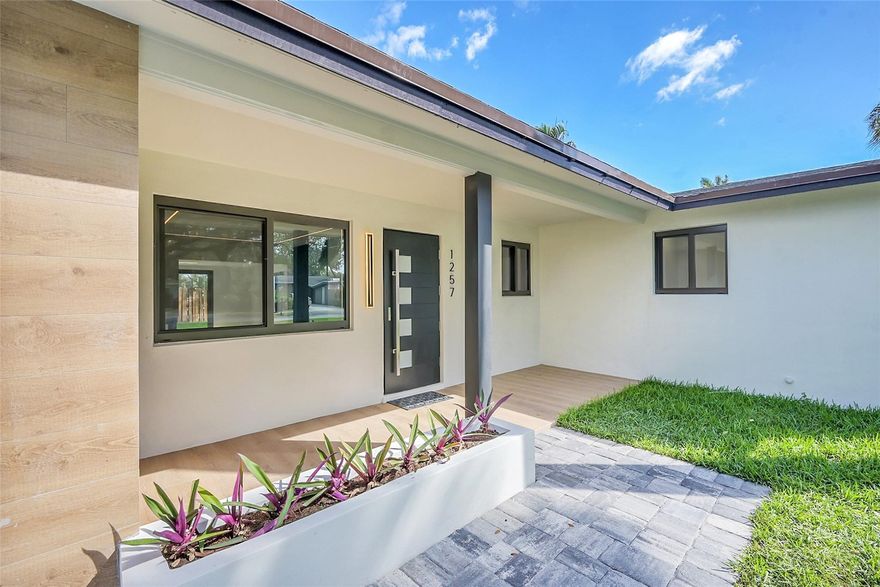 This exceptional single-story residence with a contemporary interior and a range of modern upgrades. Featuring a newly installed roof, and impact-resistant windows. The spacious backyard is complemented by a mature avocado tree, providing shade and a tranquil outdoor setting. Along with a beautifully paved patio for outdoor entertaining or relaxation. Ideally located in one of Boca Raton’s most sought-after neighborhoods, this home is just minutes from pristine beaches, upscale shopping, fine dining, scenic parks, and major highways. Highly-rated schools, as well as cultural attractions such as Mizner Park and Florida Atlantic University, are within close proximity. Located in a desirable non-gated community with no HOA fees.