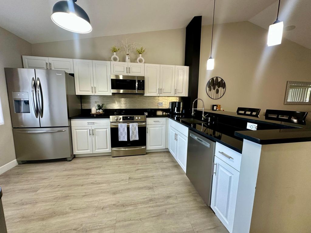 Photo of 4693 Lucerne Lakes Boulevard E #206, Lake Worth Beach, FL 33467 (MLS # R11165867)