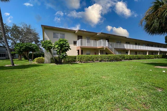 Rarely available ground-floor corner unit in the active 55+ community of Oriole Gardens. This bright and spacious home features a large living area that opens to an enclosed patio, perfect for relaxing or entertaining. The kitchen is ready for updates, offering great potential to customize and make it your own. Enjoy tile flooring throughout and updated bathrooms for added comfort. Conveniently located near shopping, dining, and with easy access to major highways. The quarterly HOA fee includes water and cable. Community amenities feature a clubhouse with a pool, large auditorium for events, game room, library, and fitness center.