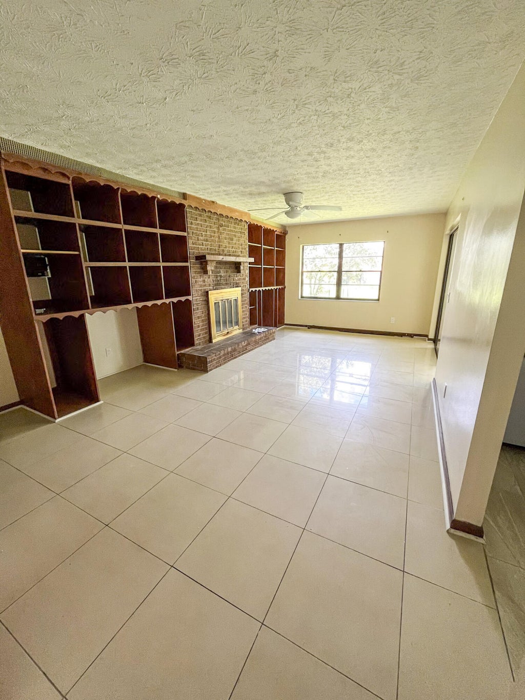 Photo of 1698 SE Manth Lane, Port Saint Lucie, FL 34983 (MLS # B26074328)