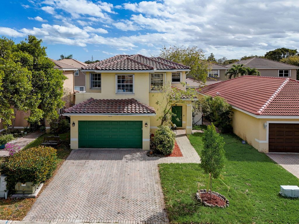 Photo of 4042 Crescent Creek Place, Coconut Creek, FL 33073 (MLS # R10970945)