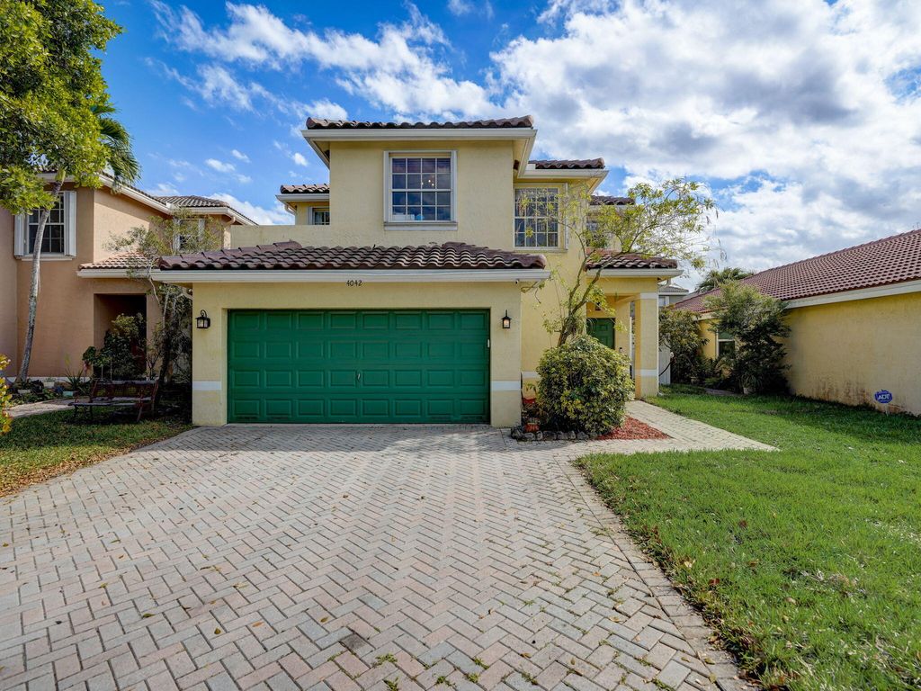 Photo of 4042 Crescent Creek Place, Coconut Creek, FL 33073 (MLS # R10970945)