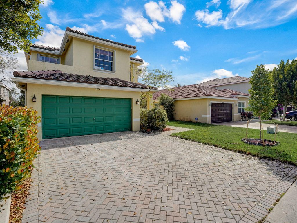 Photo of 4042 Crescent Creek Place, Coconut Creek, FL 33073 (MLS # R10970945)
